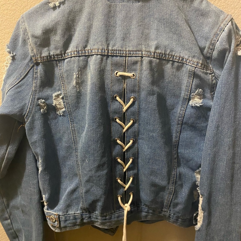 Distressed Denim Jacket with Lace-Up Back